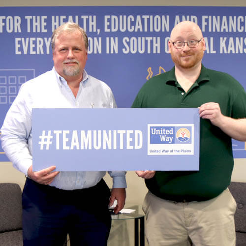James Childers, United Way's new accountant, poses with Darren Minks, Chief Financial Officer. 