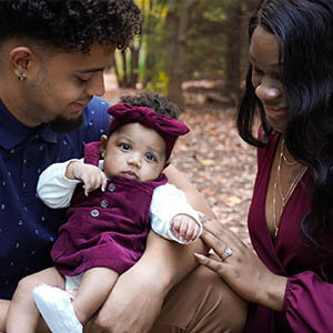 Dajahnae Vines with her husband and baby girl.
