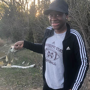 Dajahnae Vines holds the first fish she caught.