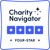 Charity Navigator four-star rating seal.