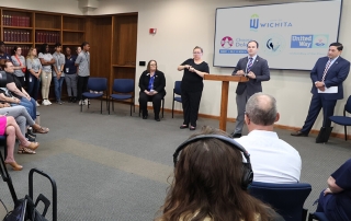 Representatives from the City of Wichita, Dole VA Medical Center, Sedgwick County and United Way of the Plains at a press release to announce their collaboration to achieve functional zero homelessness for veterans.