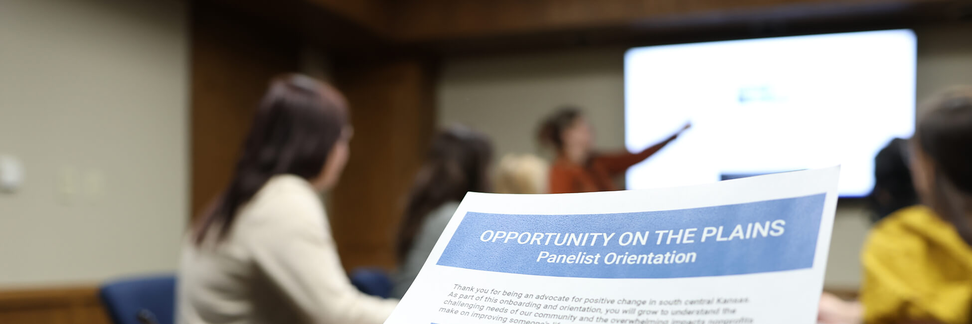 Community members convene to review grant applications.