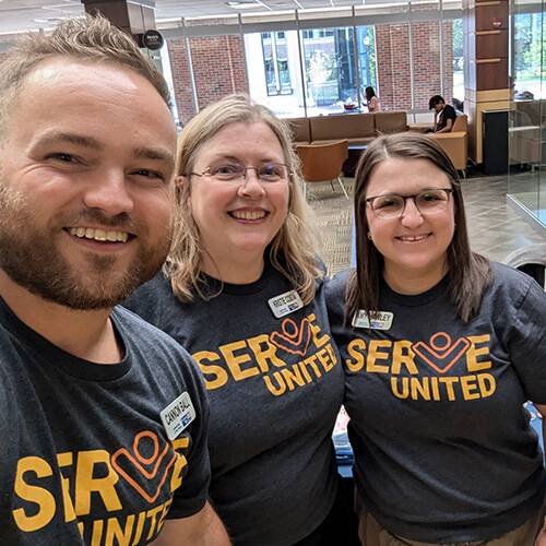 Amy Hawley, United Way Volunteer Engagement Manager, poses with staff at a Serve United volunteer project.
