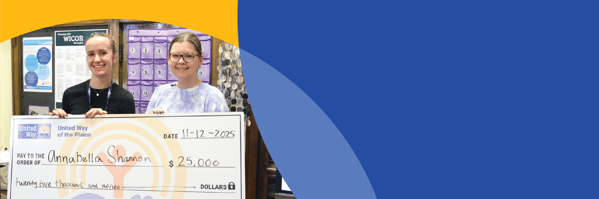 Photo of a scholarship recipient receiving a check for $25,000 from United Way in recognition of their volunteer efforts.