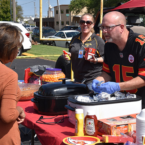 Employees at a company cookout as part of their United Way campaign.